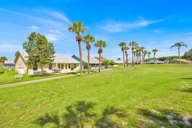 422 Harbourview Dr, Haines City, FL 33844 - view of home's community with a lawn