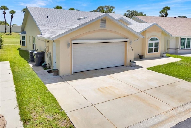 422 Harbourview Dr, Haines City, FL 33844 - ranch-style home with stucco siding, concrete driveway, an attached garage, a front lawn, and roof with shingles