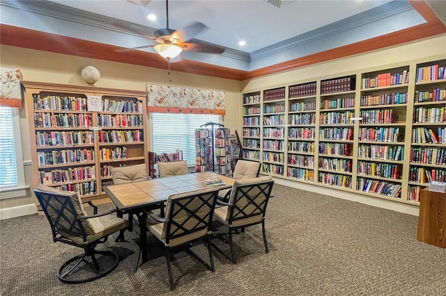 422 Harbourview Dr, Haines City, FL 33844 - carpeted home office featuring wall of books, ornamental molding, a ceiling fan, and recessed lighting
