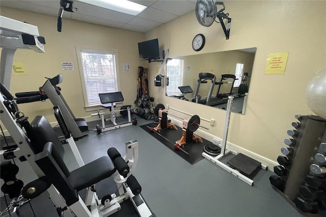 422 Harbourview Dr, Haines City, FL 33844 - workout area featuring a drop ceiling and baseboards