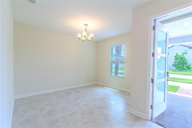 7524 Summerlake Groves St, Winter Garden, FL 34787 - spare room featuring a chandelier and light tile patterned flooring
