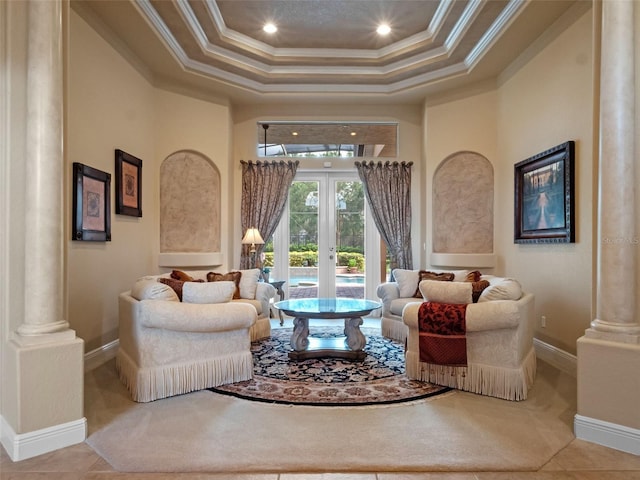 8974 Grey Hawk Pt, Orlando, FL 32836 - living area with ornate columns, french doors, ornamental molding, a raised ceiling, and recessed lighting