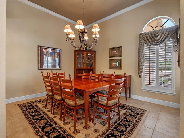 8974 Grey Hawk Pt, Orlando, FL 32836 - dining room with crown molding, a chandelier, healthy amount of natural light, and light tile patterned floors