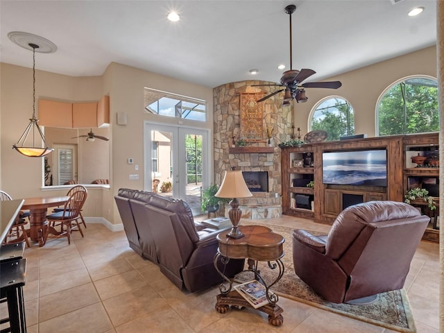 8974 Grey Hawk Pt, Orlando, FL 32836 - living area with ceiling fan, healthy amount of natural light, light tile patterned floors, and recessed lighting