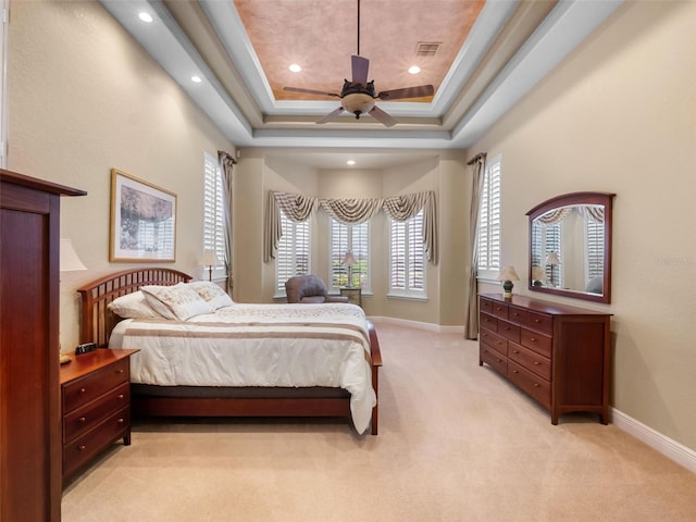 8974 Grey Hawk Pt, Orlando, FL 32836 - bedroom featuring light colored carpet, recessed lighting, a tray ceiling, and ceiling fan