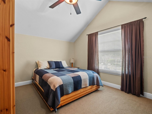 8974 Grey Hawk Pt, Orlando, FL 32836 - bedroom with vaulted ceiling, carpet floors, and a ceiling fan