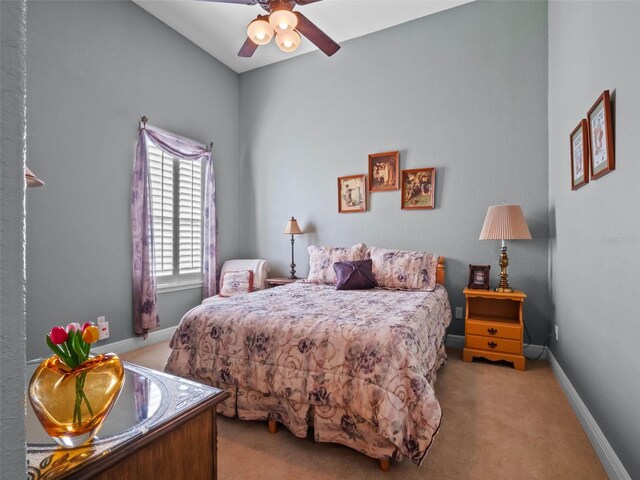 8974 Grey Hawk Pt, Orlando, FL 32836 - carpeted bedroom with baseboards and a ceiling fan