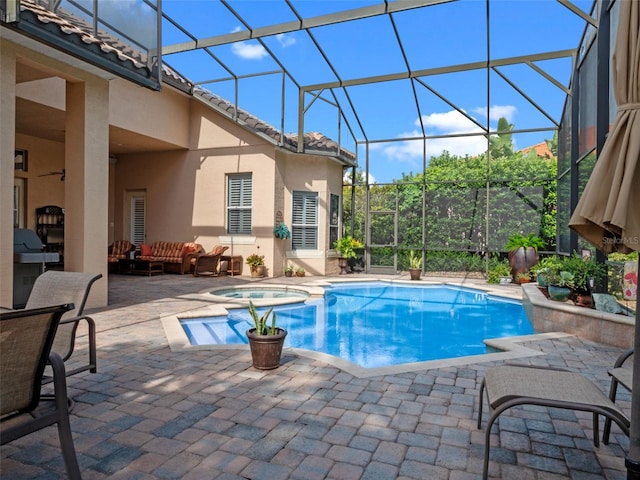 8974 Grey Hawk Pt, Orlando, FL 32836 - view of swimming pool with a patio, a pool with connected hot tub, glass enclosure, and an outdoor living space