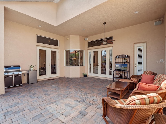 8974 Grey Hawk Pt, Orlando, FL 32836 - view of patio with french doors, area for grilling, and a ceiling fan
