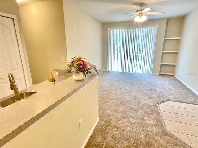 1375 Lake Shadow Cir Unit 11203, Maitland, FL 32751 - unfurnished living room featuring carpet flooring, a ceiling fan, and built in shelves