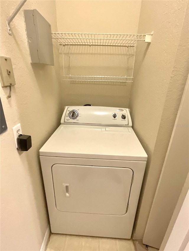 1375 Lake Shadow Cir Unit 11203, Maitland, FL 32751 - laundry area with washer / clothes dryer and light tile patterned flooring