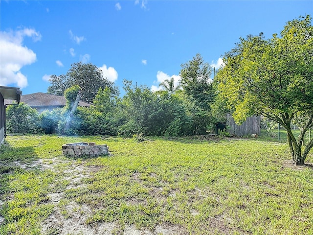 1510 Chatsworth Ave, Deltona, FL 32738 - view of yard with a fire pit