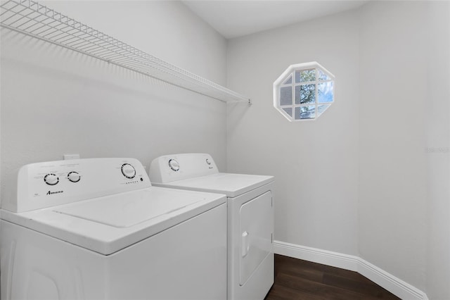 1121 Needlewood Loop, Oviedo, FL 32765 - laundry room with separate washer and dryer and dark wood-style flooring