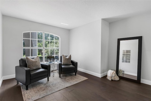 1121 Needlewood Loop, Oviedo, FL 32765 - sitting room featuring baseboards and wood finished floors
