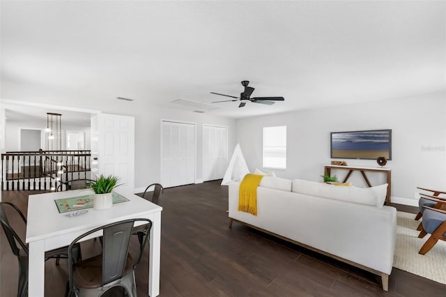 1121 Needlewood Loop, Oviedo, FL 32765 - living room with dark wood-style floors and ceiling fan