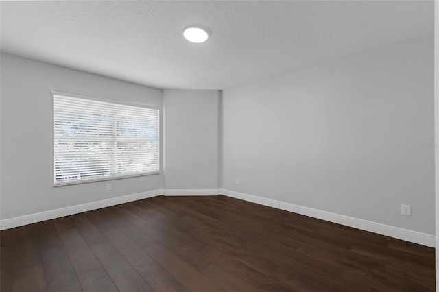 1121 Needlewood Loop, Oviedo, FL 32765 - empty room with dark wood-style flooring