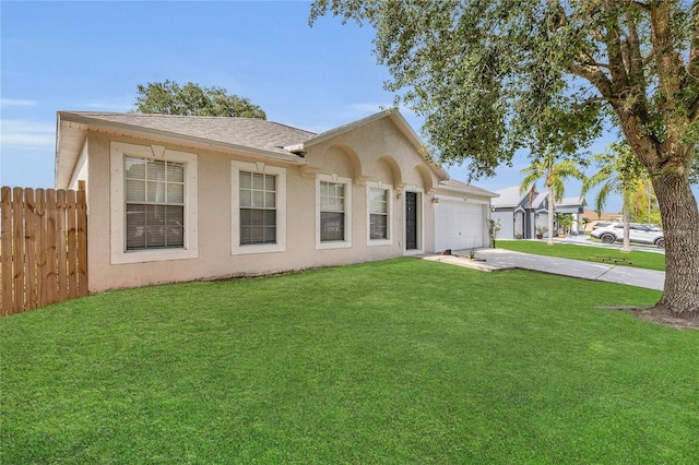 1617 Fairlight St NW, Palm Bay, FL 32907 - view of front of house featuring concrete driveway, an attached garage, stucco siding, and a shingled roof