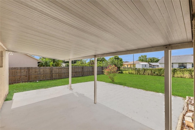 1617 Fairlight St NW, Palm Bay, FL 32907 - fenced backyard with a patio