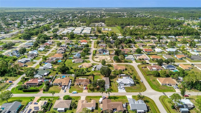1617 Fairlight St NW, Palm Bay, FL 32907 - aerial view of property and surrounding area featuring nearby suburban area