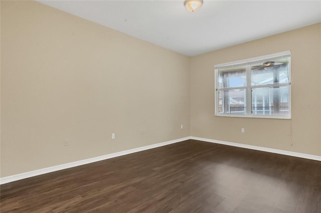 2408 Groveway Dr, Valrico, FL 33596 - unfurnished room featuring dark wood-type flooring and baseboards