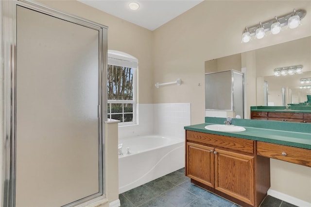 2408 Groveway Dr, Valrico, FL 33596 - bathroom with a stall shower, vanity, and a bath
