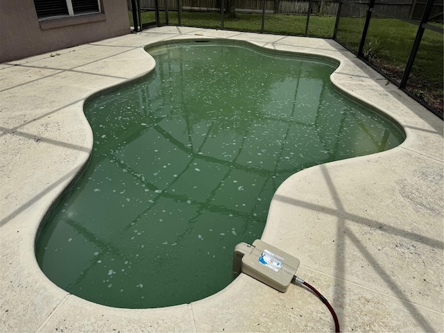 2116 New Victor Rd, Ocoee, FL 34761 - swimming pool featuring a patio area and glass enclosure