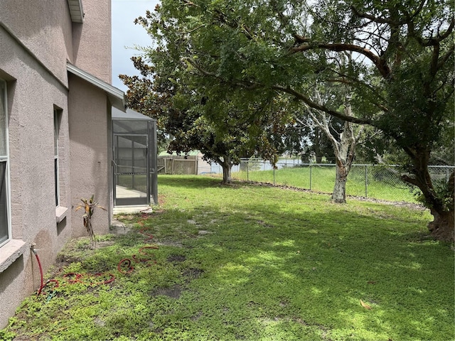 2116 New Victor Rd, Ocoee, FL 34761 - fenced backyard featuring a lanai