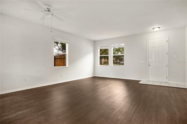 13510 Copper Belly Ct, Riverview, FL 33569 - empty room featuring a ceiling fan and dark wood finished floors