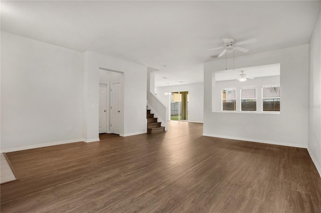 13510 Copper Belly Ct, Riverview, FL 33569 - unfurnished living room with ceiling fan, stairway, and wood finished floors