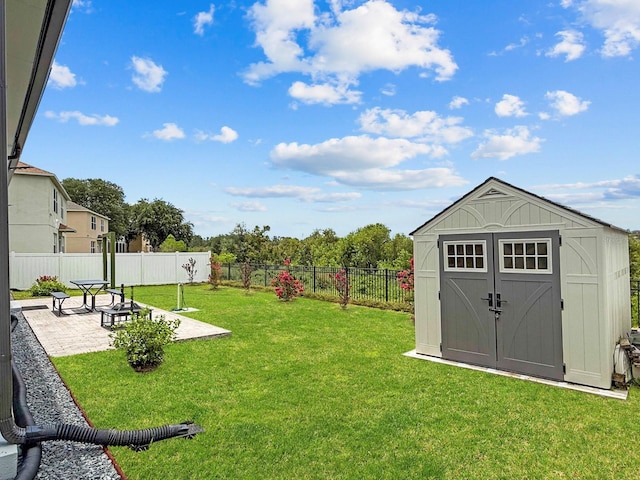 5209 Cape Hatteras Dr, Clermont, FL 34714 - fenced backyard with a shed and a patio area