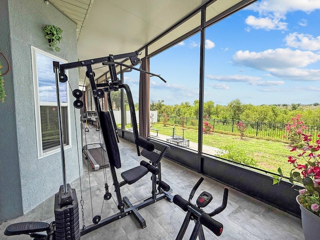 5209 Cape Hatteras Dr, Clermont, FL 34714 - exercise room featuring a textured wall