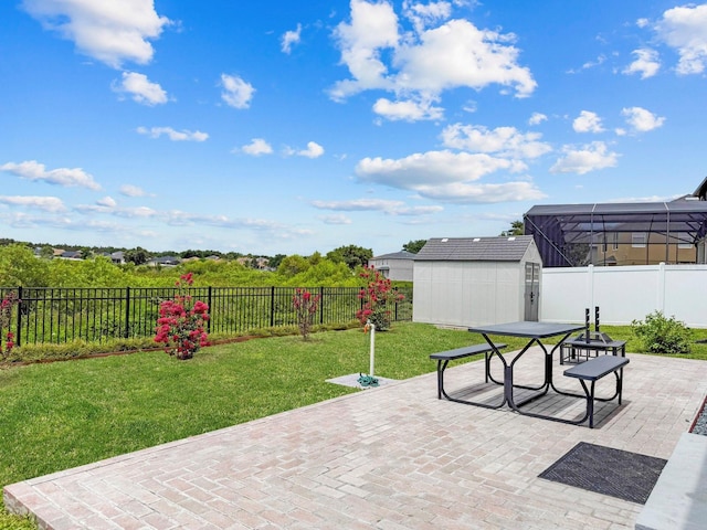 5209 Cape Hatteras Dr, Clermont, FL 34714 - fenced backyard with a patio area, a storage shed, and outdoor dining area