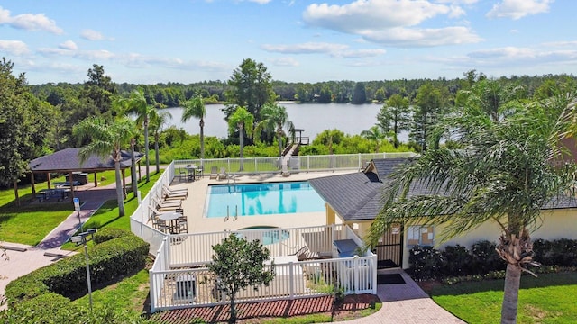 5209 Cape Hatteras Dr, Clermont, FL 34714 - community pool with a water view and a gazebo