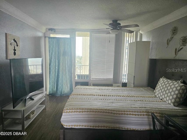 3501 S Atlantic Ave Unit 5020, Daytona Beach, FL 32118 - bedroom featuring a textured wall, a textured ceiling, wood finished floors, and crown molding