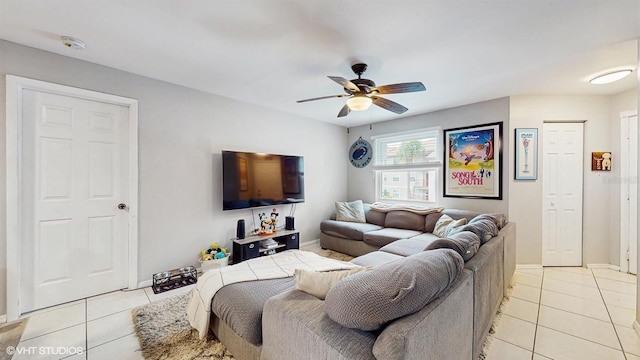 3012 Parkway Blvd Unit 203, Kissimmee, FL 34747 - living area featuring light tile patterned floors and ceiling fan