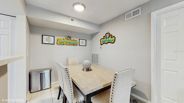 3012 Parkway Blvd Unit 203, Kissimmee, FL 34747 - dining area featuring baseboards and light tile patterned floors