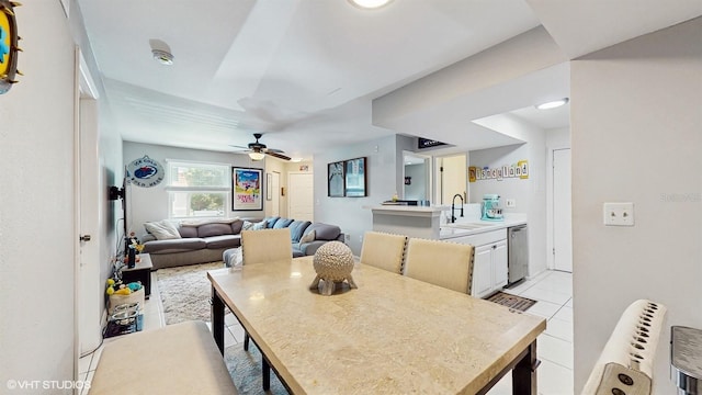 3012 Parkway Blvd Unit 203, Kissimmee, FL 34747 - dining area with light tile patterned floors and ceiling fan