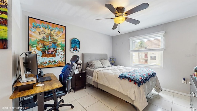 3012 Parkway Blvd Unit 203, Kissimmee, FL 34747 - bedroom with light tile patterned floors, a desk, and a ceiling fan