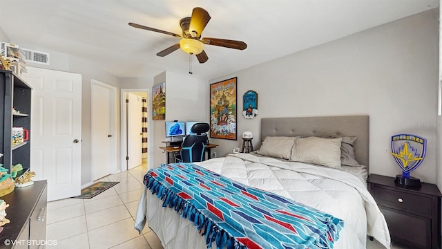 3012 Parkway Blvd Unit 203, Kissimmee, FL 34747 - bedroom with light tile patterned floors and ceiling fan