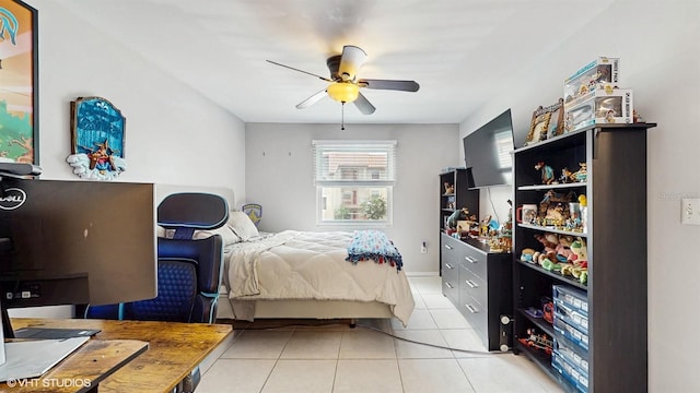 3012 Parkway Blvd Unit 203, Kissimmee, FL 34747 - bedroom featuring light tile patterned flooring and ceiling fan