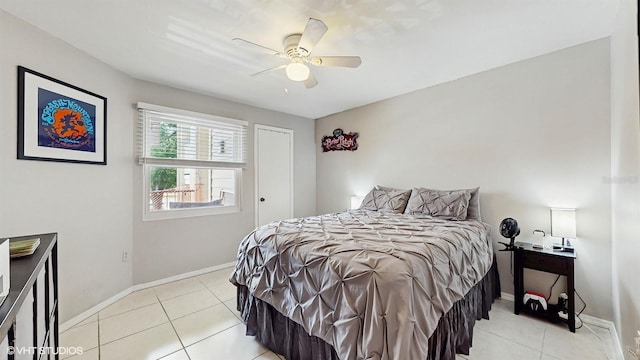 3012 Parkway Blvd Unit 203, Kissimmee, FL 34747 - bedroom with light tile patterned floors and a ceiling fan