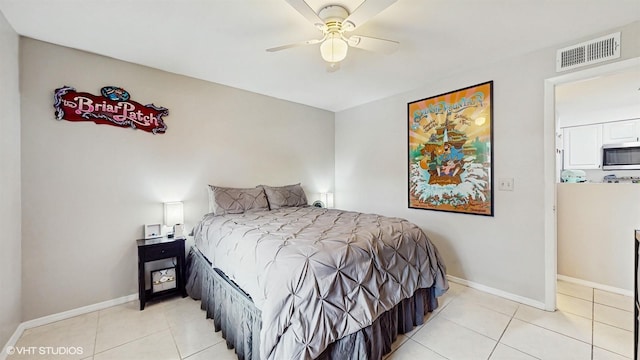 3012 Parkway Blvd Unit 203, Kissimmee, FL 34747 - bedroom with light tile patterned floors and a ceiling fan