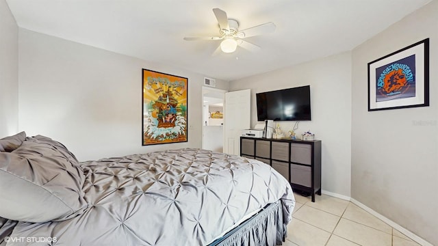 3012 Parkway Blvd Unit 203, Kissimmee, FL 34747 - bedroom with light tile patterned flooring and ceiling fan
