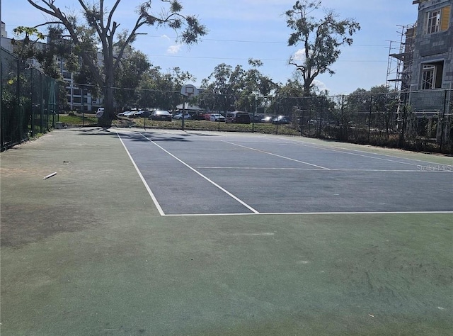 3012 Parkway Blvd Unit 203, Kissimmee, FL 34747 - view of tennis court with community basketball court