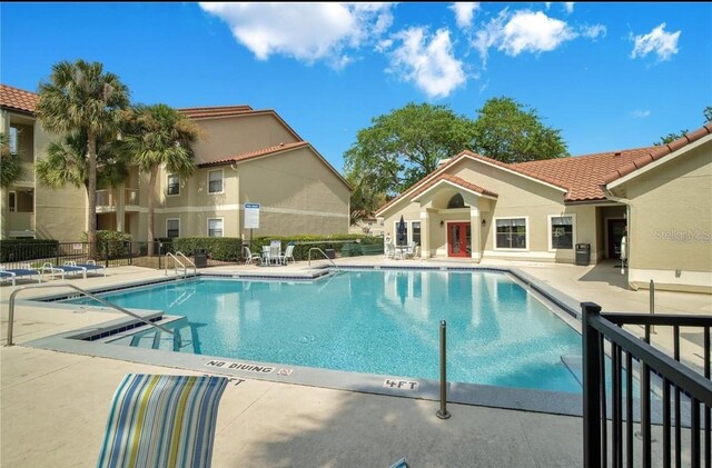 3012 Parkway Blvd Unit 203, Kissimmee, FL 34747 - community pool with a patio