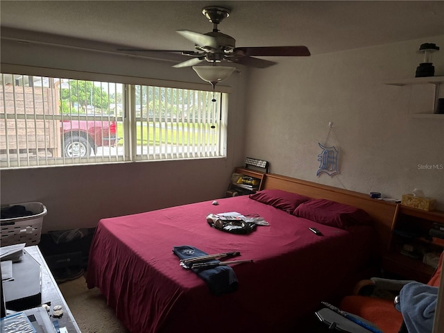 4427 Gilpin Way, Orlando, FL 32812 - bedroom with multiple windows and a ceiling fan