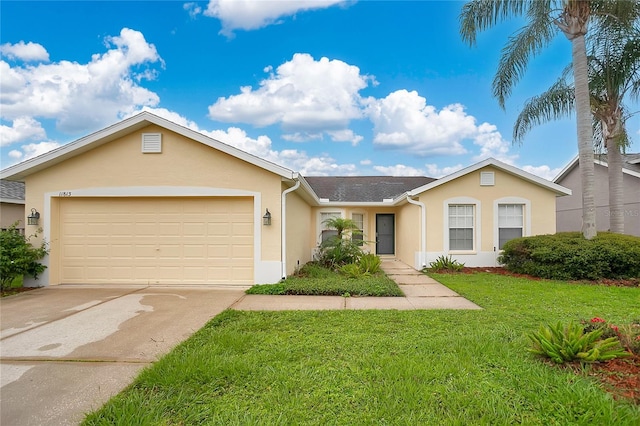 11813 Colyar Ln, Parrish, FL 34219 - single story home with stucco siding, a garage, driveway, and a front lawn
