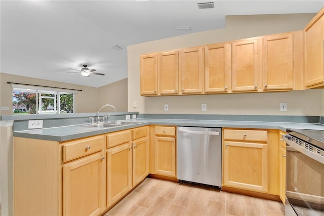 11813 Colyar Ln, Parrish, FL 34219 - kitchen with appliances with stainless steel finishes, light brown cabinets, a peninsula, and a ceiling fan