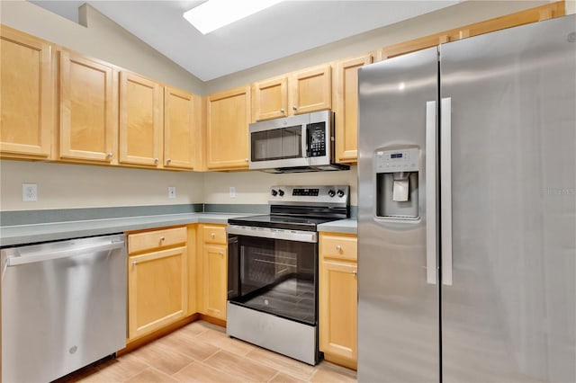 11813 Colyar Ln, Parrish, FL 34219 - kitchen featuring appliances with stainless steel finishes, light brown cabinets, and light countertops
