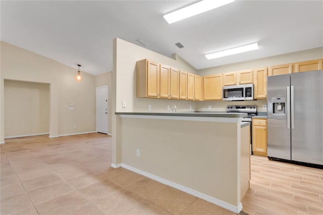11813 Colyar Ln, Parrish, FL 34219 - kitchen featuring stainless steel appliances, lofted ceiling, light brown cabinetry, and a peninsula